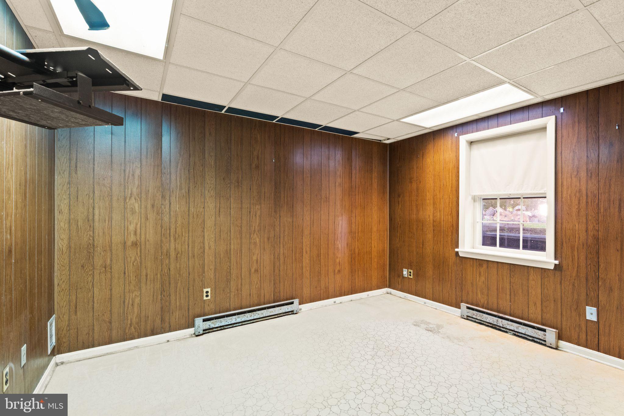 8311 Pohick Road Springfield, VA 22153 - Photo 61 of 92 an empty room with windows