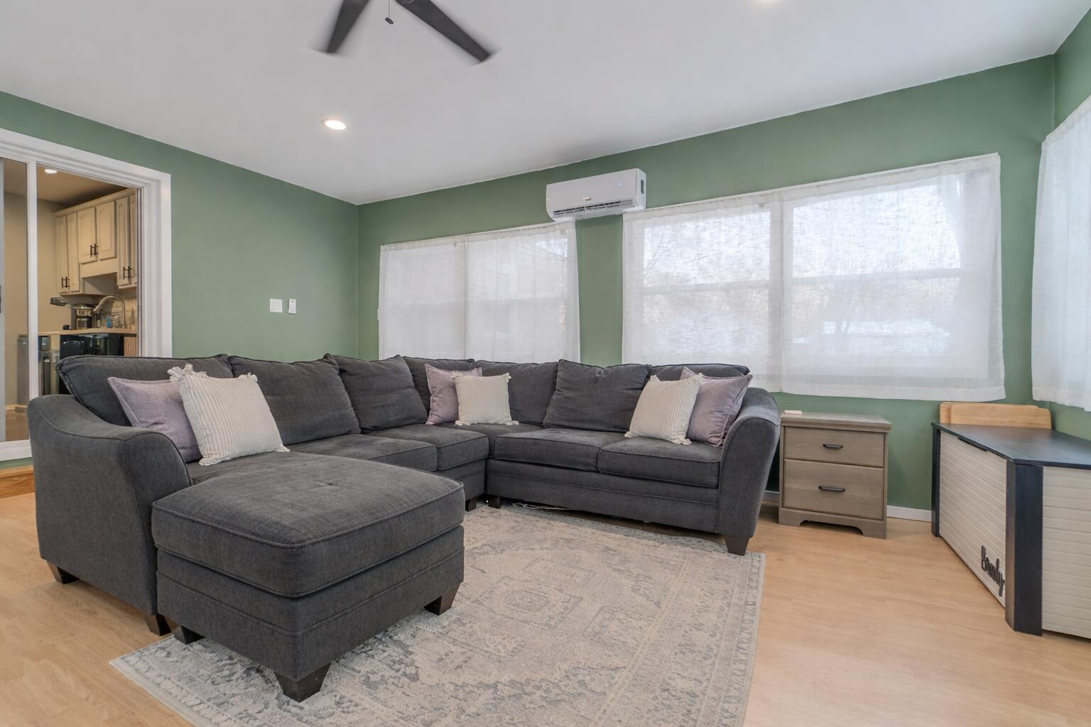 2934 Parker Street Portage, IN 46368 - Photo 11 of 16 a living room with furniture and a large window