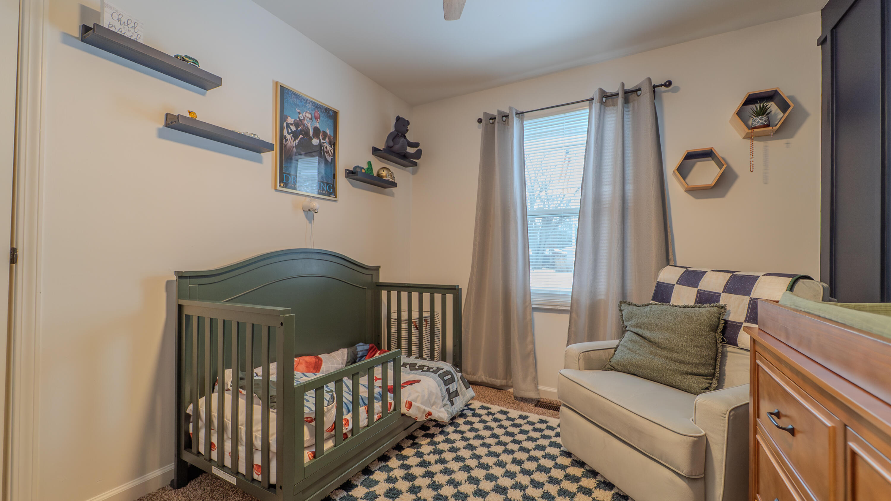 2934 Parker Street Portage, IN 46368 - Photo 13 of 16 a bedroom with a bed and a window