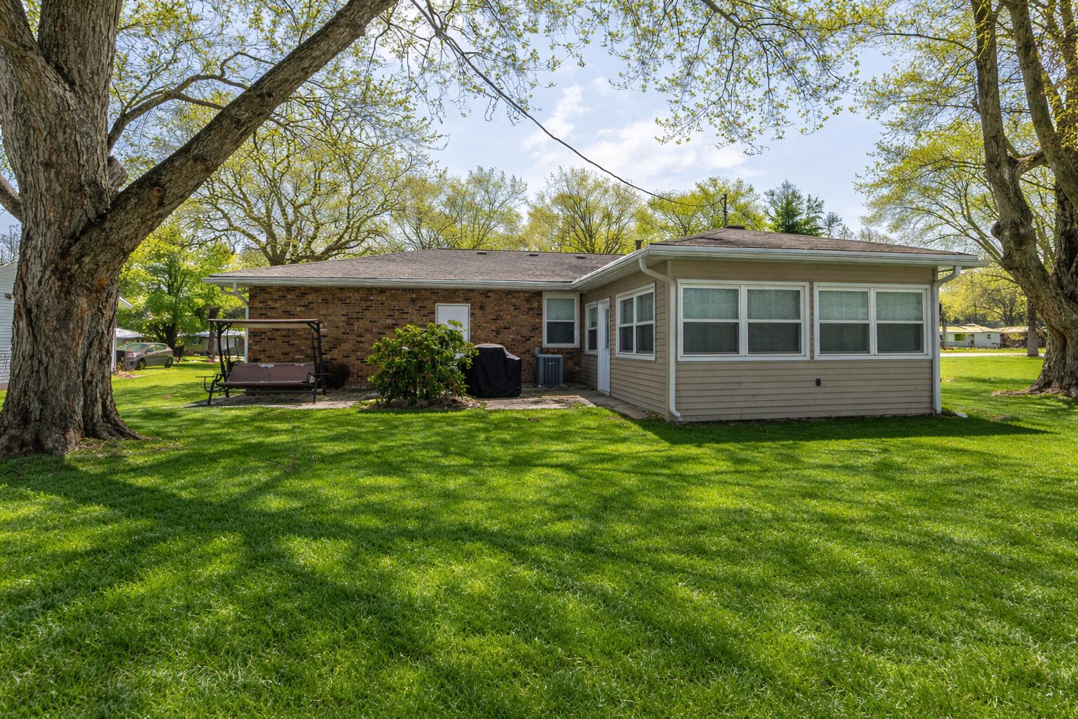 2934 Parker Street Portage, IN 46368 - Photo 3 of 16 a view of a house with a backyard