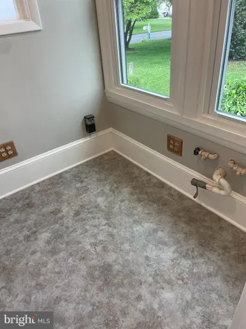 a view of a window in an empty room