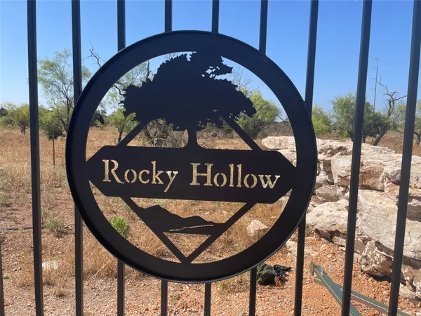 a view of a sign in a yard