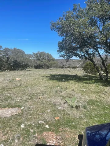 a view of a lake with a mountain