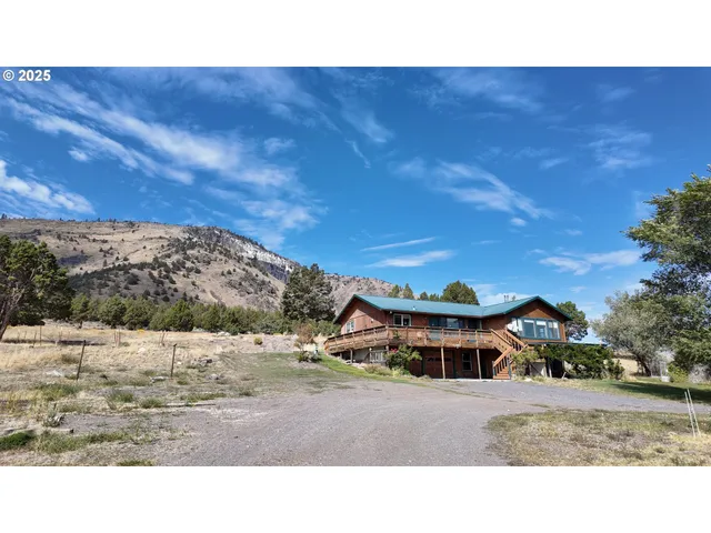 a black and white photo of a house