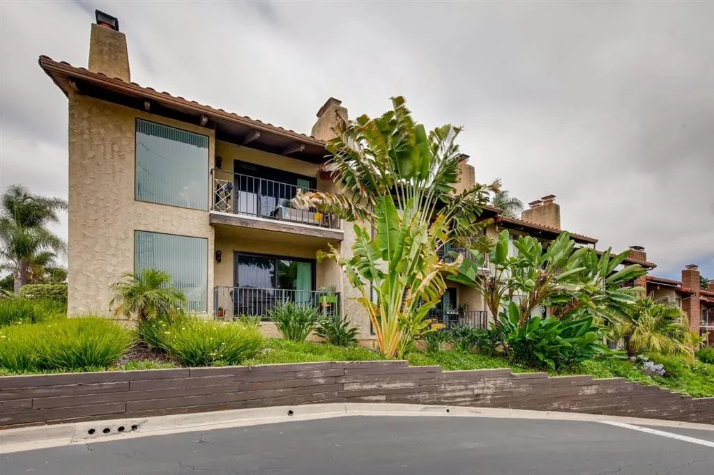 1913 Alga Road Carlsbad, CA 92009 - Photo 20 of 25 a front view of a house with a garden