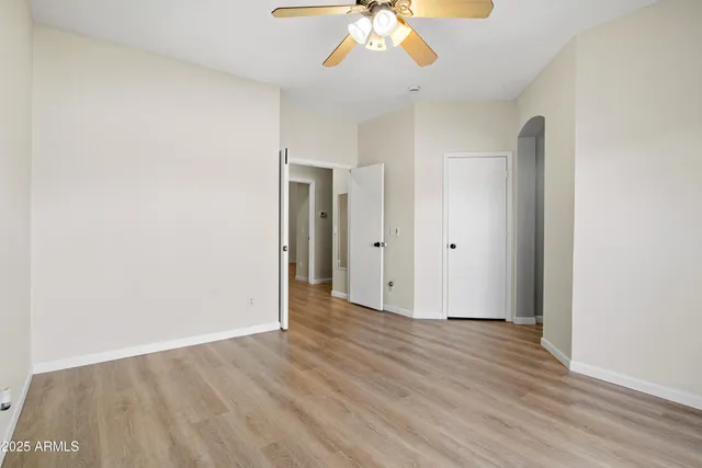 a bathroom with a sink a vanity a mirror a vanity and shower