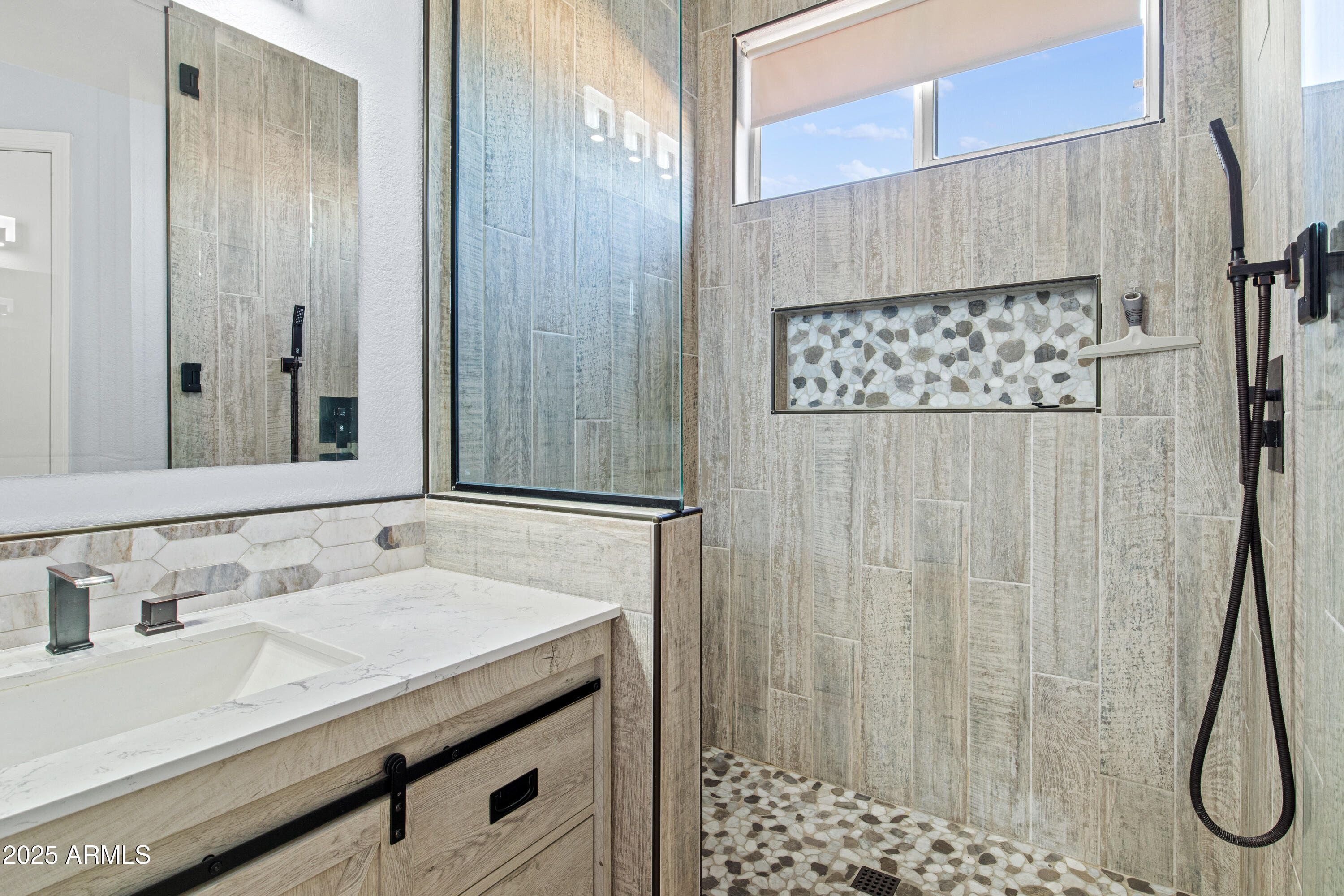 625 North Hamilton Street, Unit 41 Chandler, AZ 85225 - Photo 17 of 36 a bathroom with a sink and a mirror