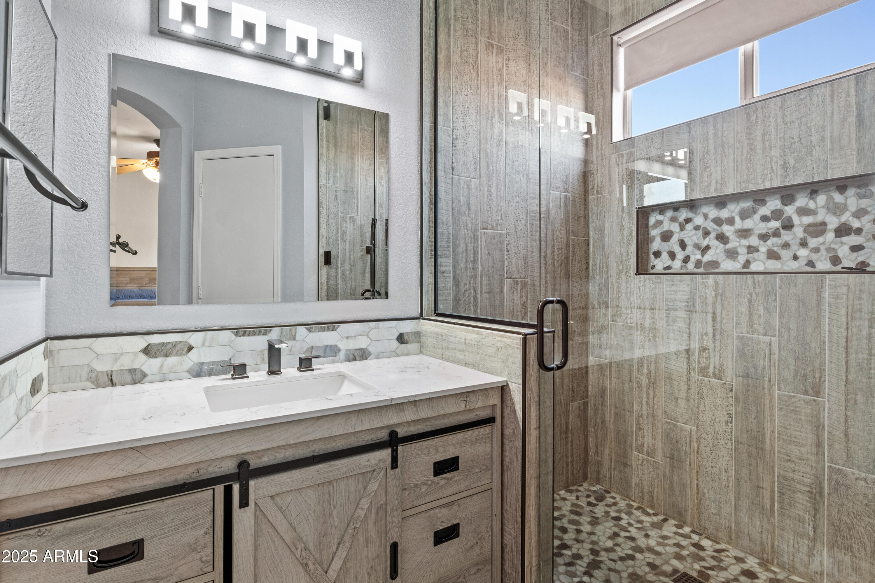 625 North Hamilton Street, Unit 41 Chandler, AZ 85225 - Photo 18 of 36 a bathroom with a sink a vanity and a mirror