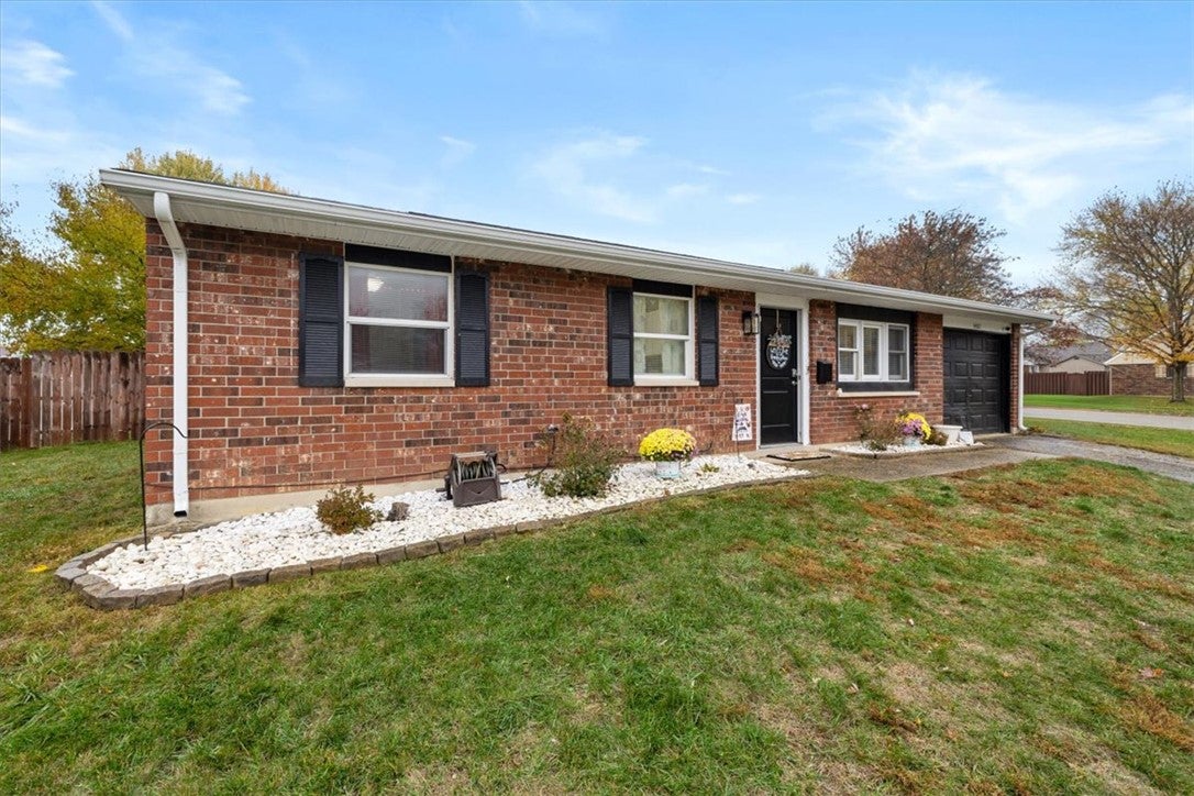 1482 Lee Road Troy, OH 45373 - Photo 1 of 30 This brick residence features an attached garage and a well-maintained front yard.
