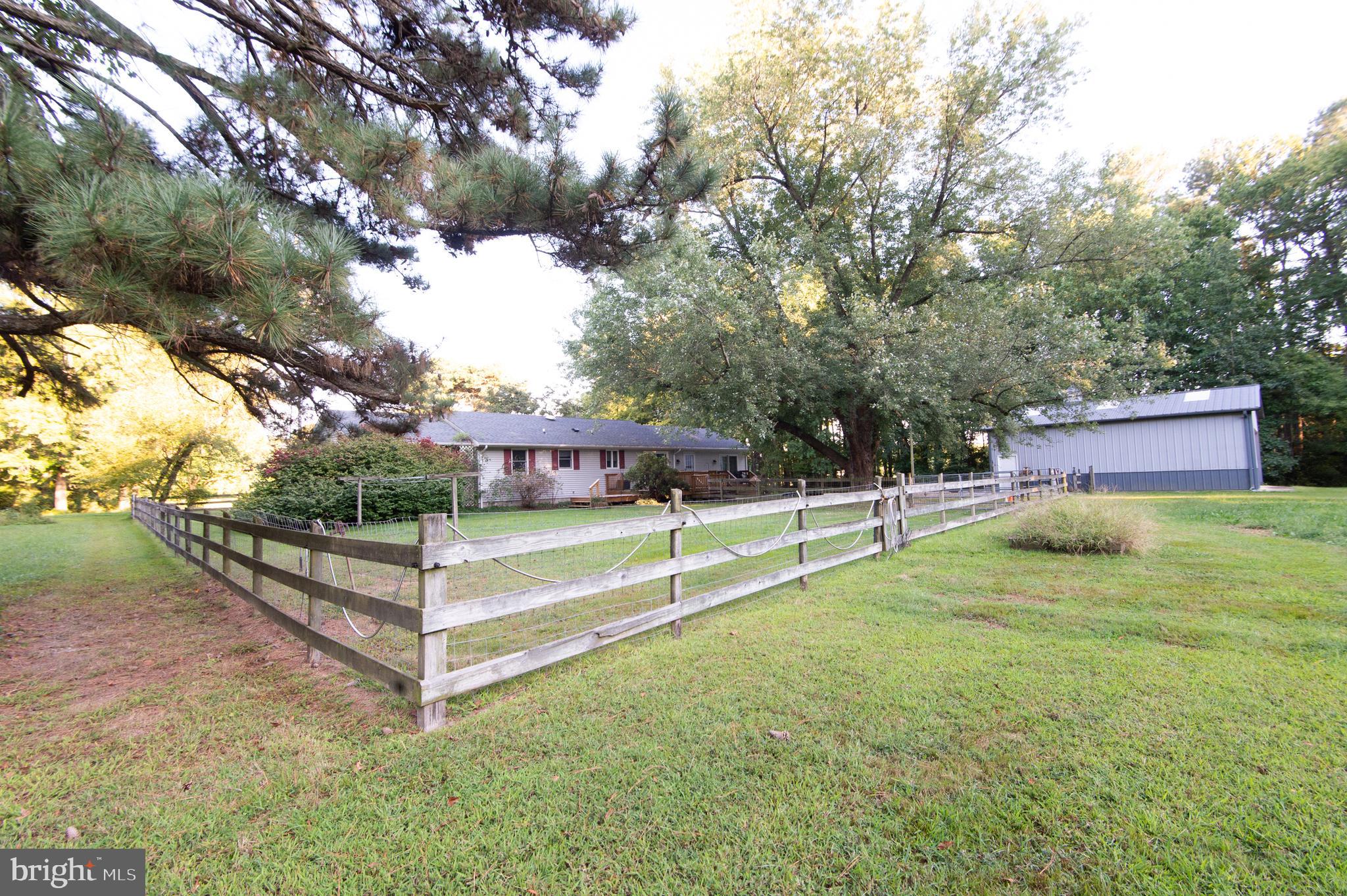 11482 Kittys Corner Road Cordova, MD 21625 - Photo 11 of 68 a view of a house with a yard