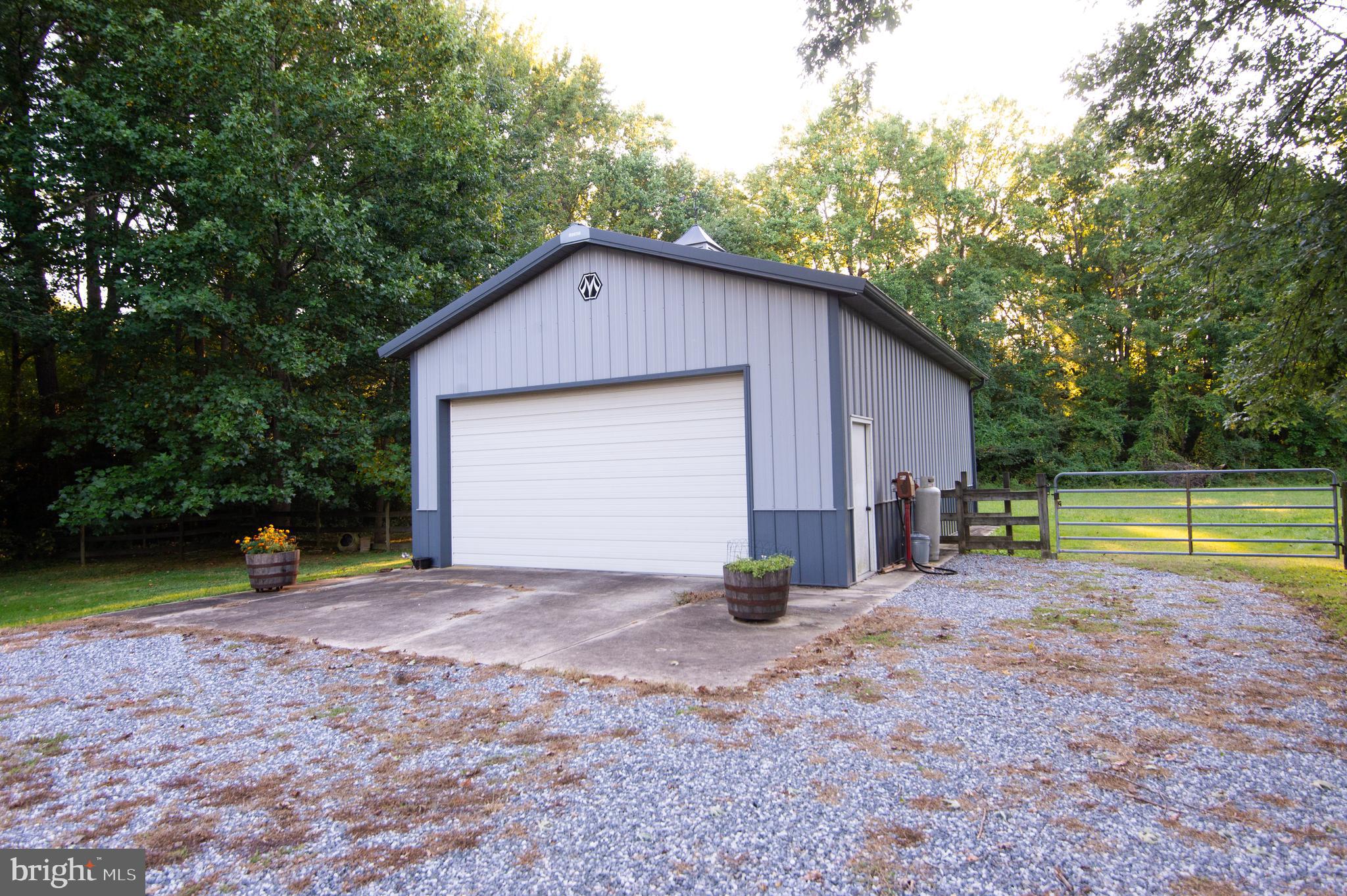 11482 Kittys Corner Road Cordova, MD 21625 - Photo 18 of 68 a view of a house with a swimming pool