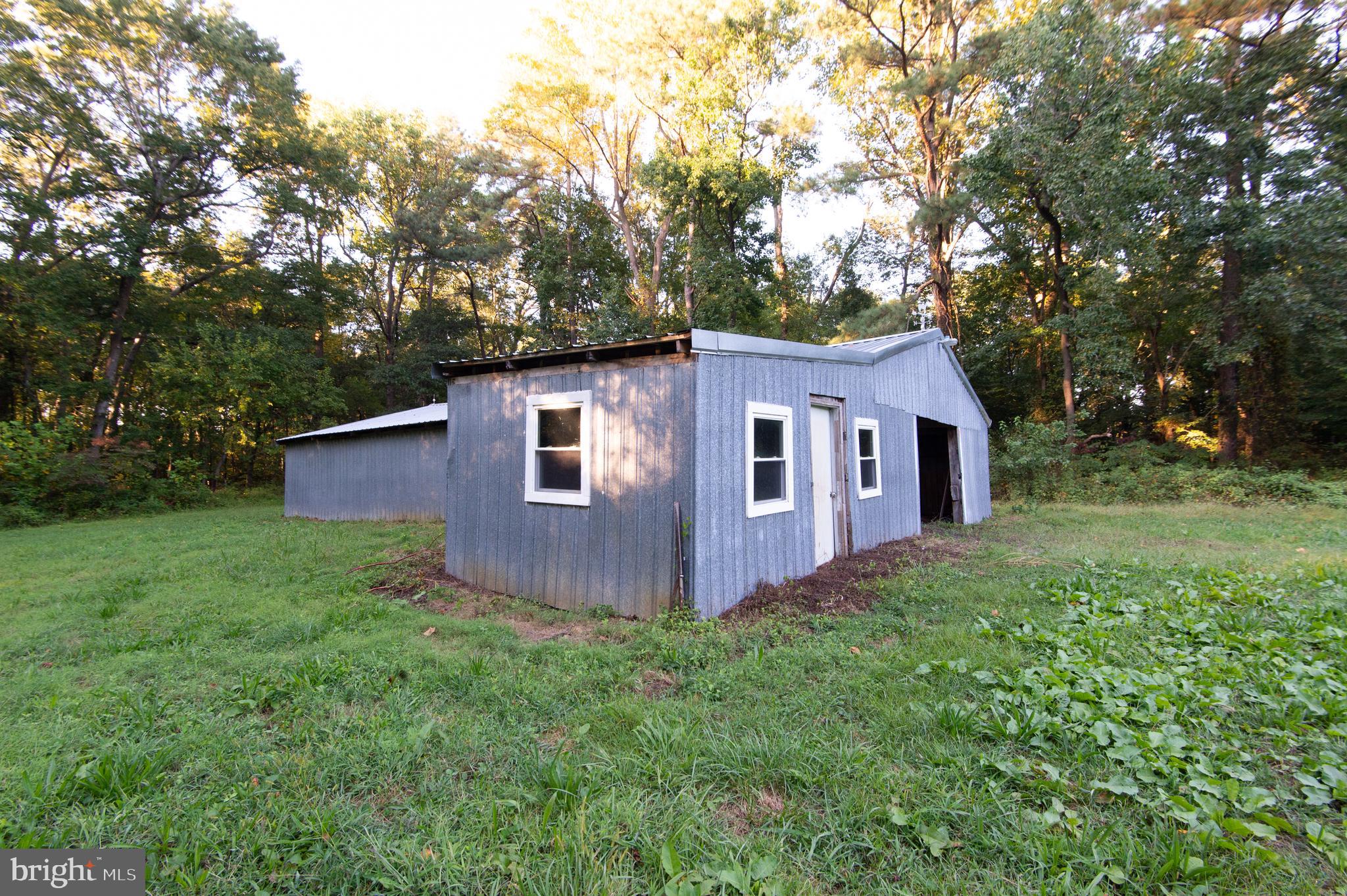 11482 Kittys Corner Road Cordova, MD 21625 - Photo 29 of 68 a view of a house with backyard and garden
