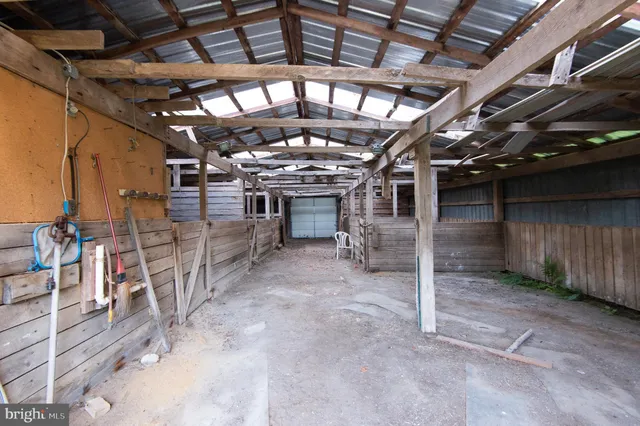 a kitchen with a sink appliances and cabinets