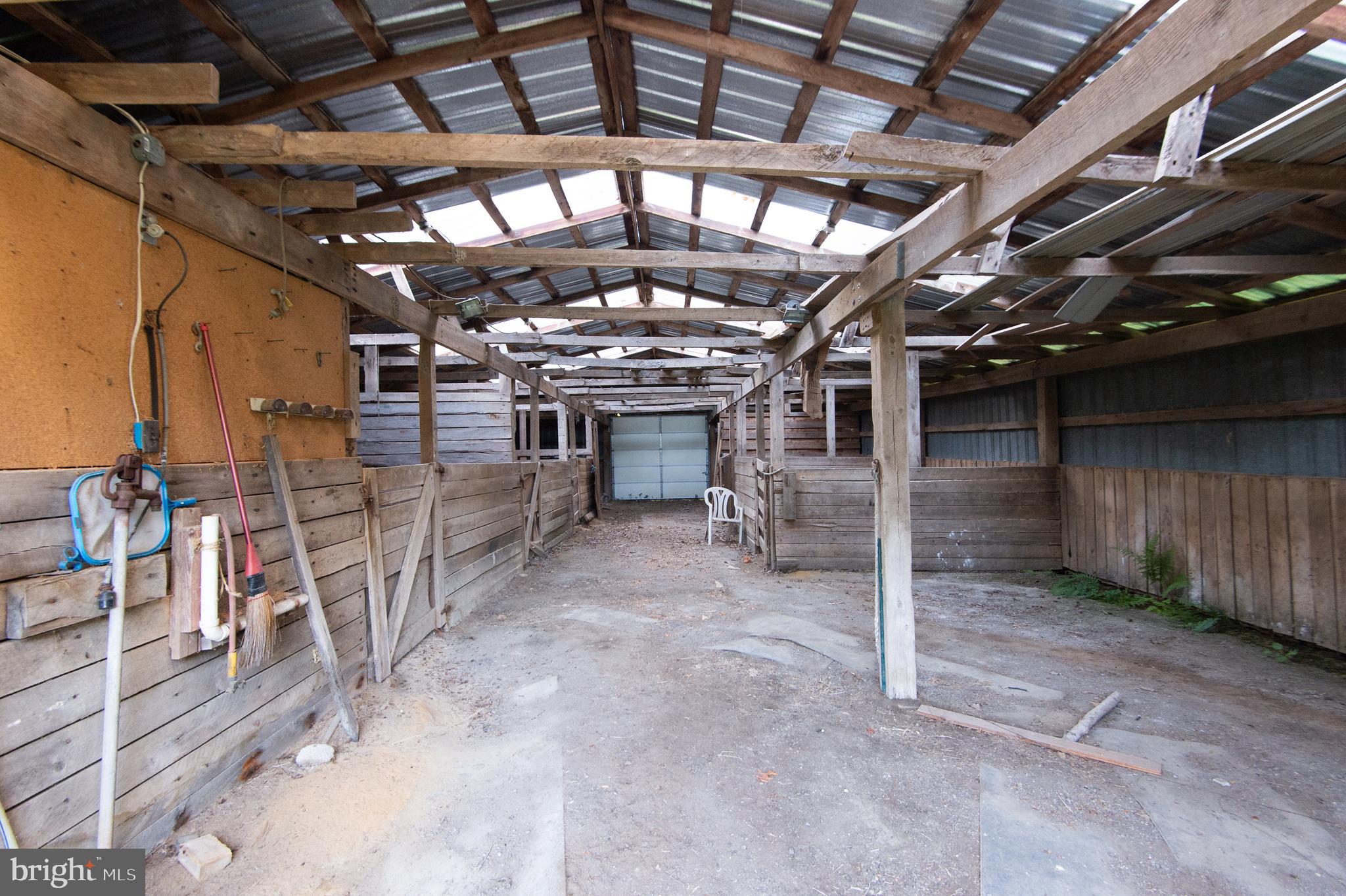 11482 Kittys Corner Road Cordova, MD 21625 - Photo 30 of 68 a view of an empty room with wooden roof