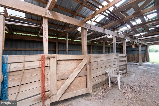 a bathroom with a sink a mirror and a shower