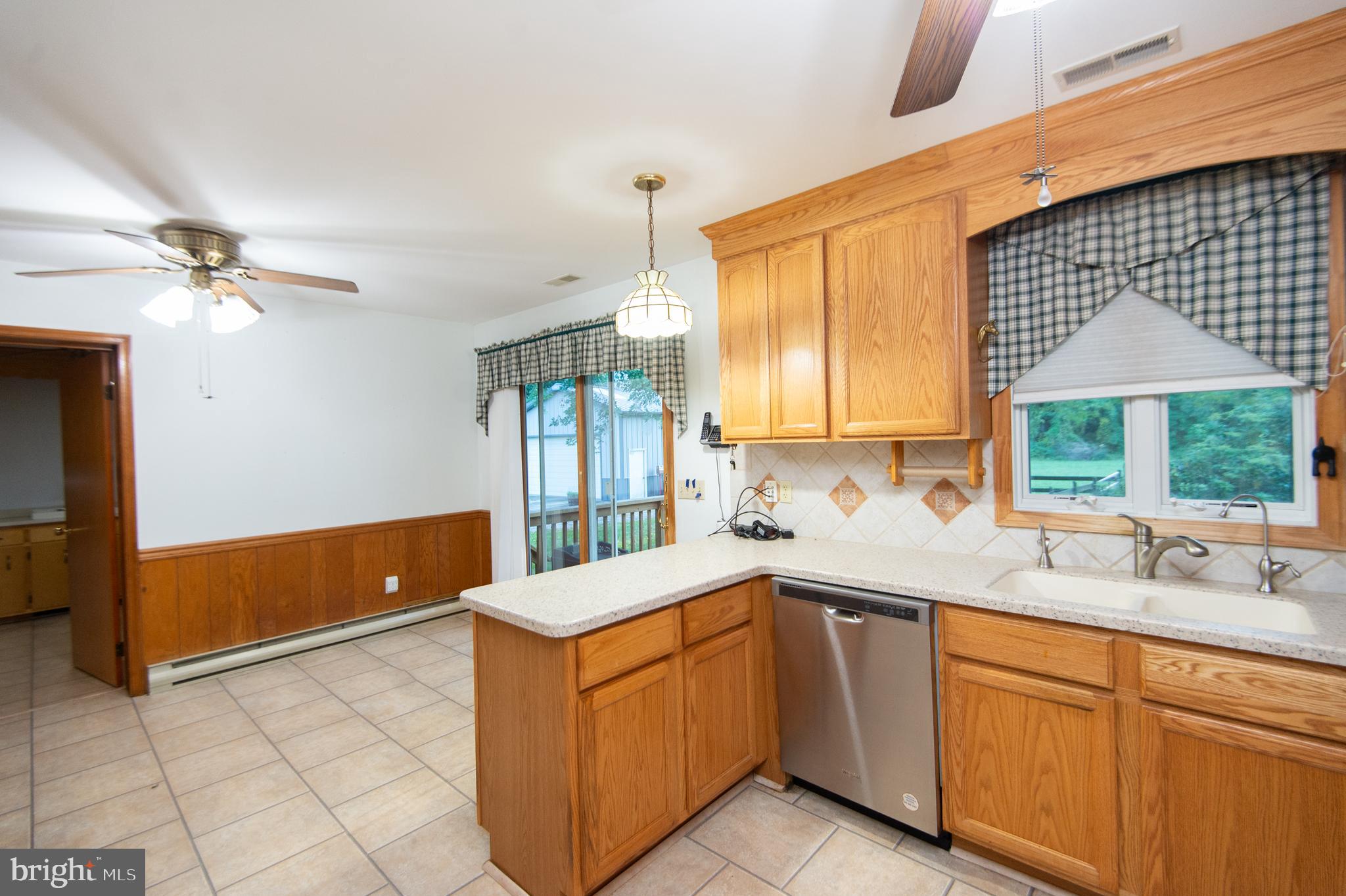 11482 Kittys Corner Road Cordova, MD 21625 - Photo 44 of 68 a kitchen with a sink and cabinets