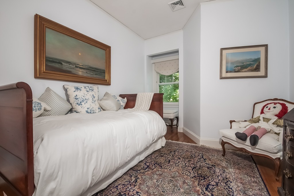 53 Tupelo Road Swampscott, MA 01907 - Photo 20 of 28 a bedroom with a bed and a painting on the wall