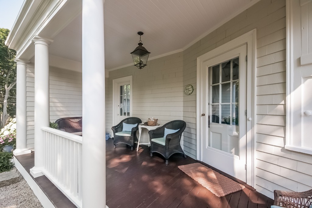 53 Tupelo Road Swampscott, MA 01907 - Photo 22 of 28 a view of a house with outdoor seating space