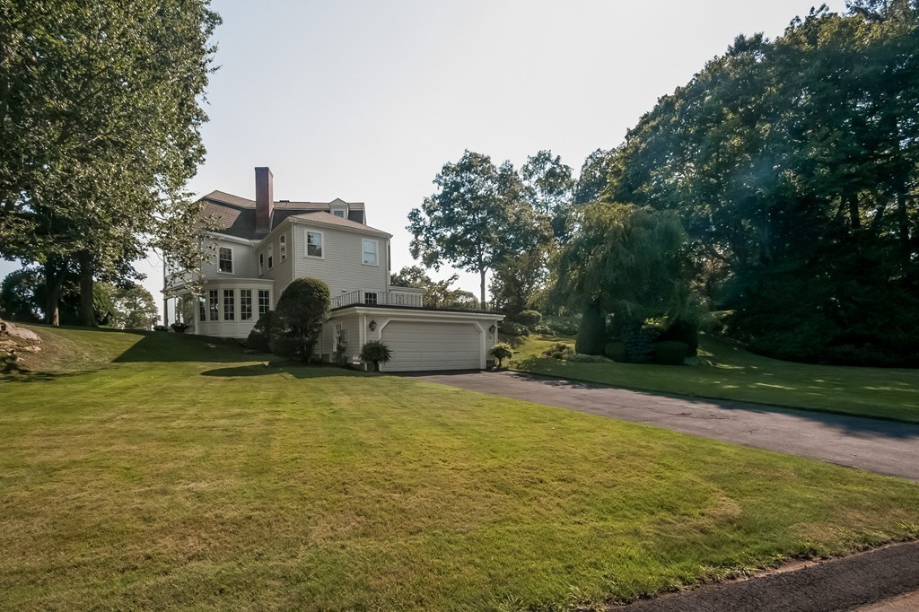 53 Tupelo Road Swampscott, MA 01907 - Photo 24 of 28 a front view of a house with a yard