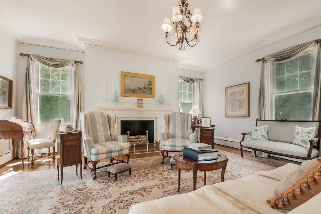 53 Tupelo Road Swampscott, MA 01907 - Photo 4 of 28 a living room with furniture and a fireplace