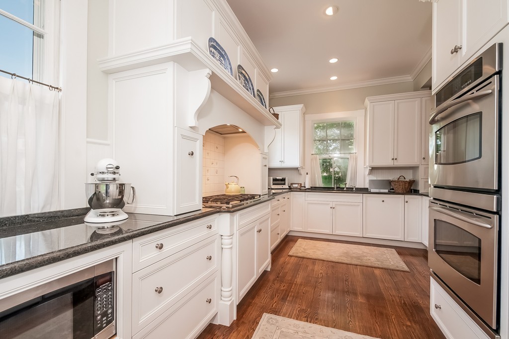 53 Tupelo Road Swampscott, MA 01907 - Photo 10 of 28 a large kitchen with granite countertop a sink stainless steel appliances and cabinets
