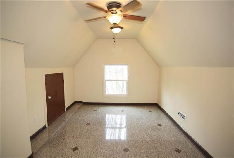 2737 Tarva Place Duluth, GA 30097 - Photo 18 of 33 an empty room with windows and fan