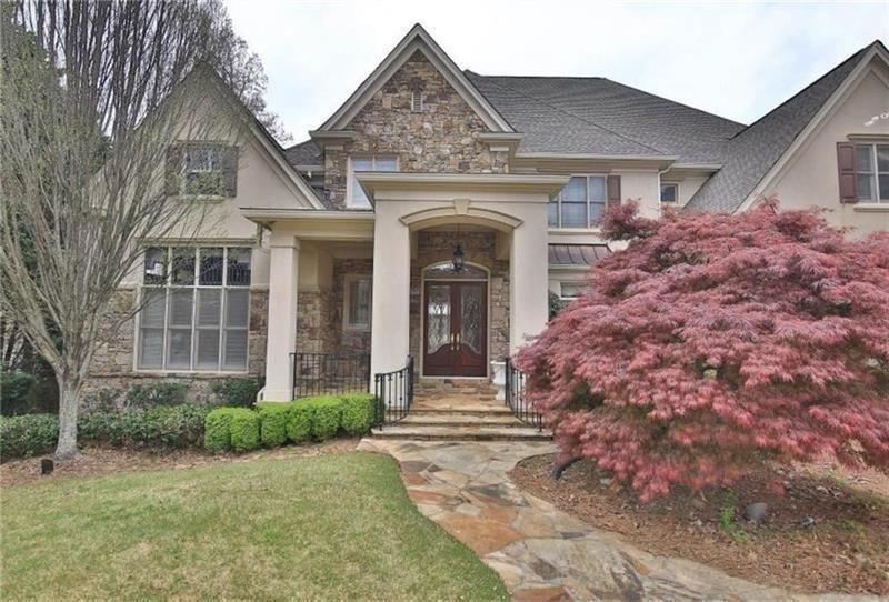 2737 Tarva Place Duluth, GA 30097 - Photo 3 of 33 a front view of a house with garden