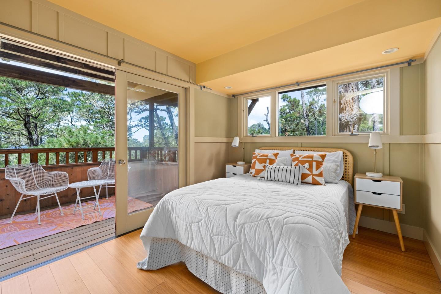 73 Mt Devon Road Carmel Highlands, CA 93923 - Photo 49 of 88 a bedroom with a bed and a large window