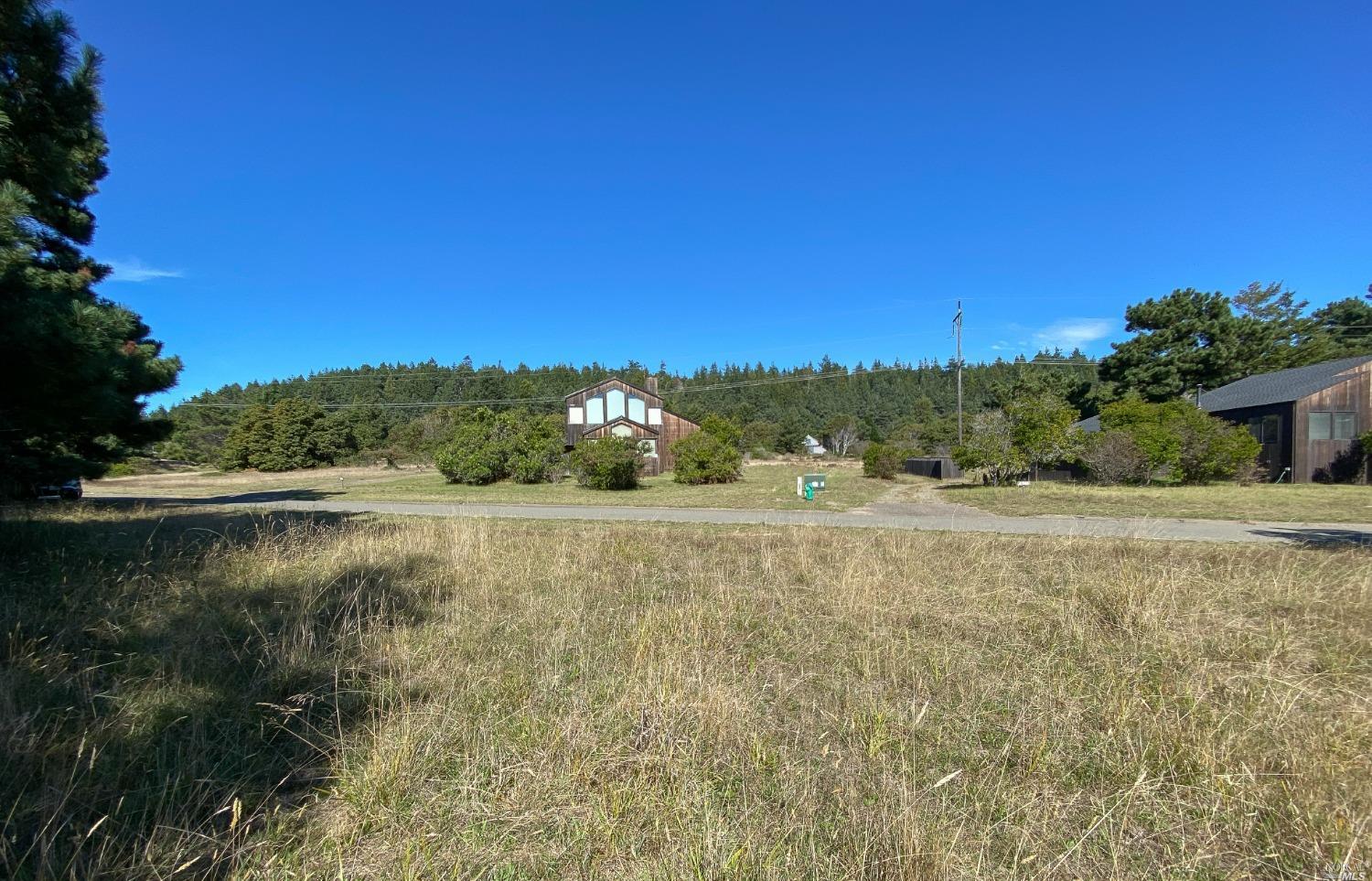 41179 Deer Trail The Sea Ranch, CA 95497 - Photo 16 of 33 a view of lake with mountain
