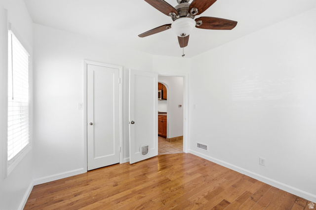1925 South Main Street Bountiful, UT 84010 - Photo 17 of 48 Room featuring wood-finish flooring, a ceiling fan with light fixture, and white window blinds