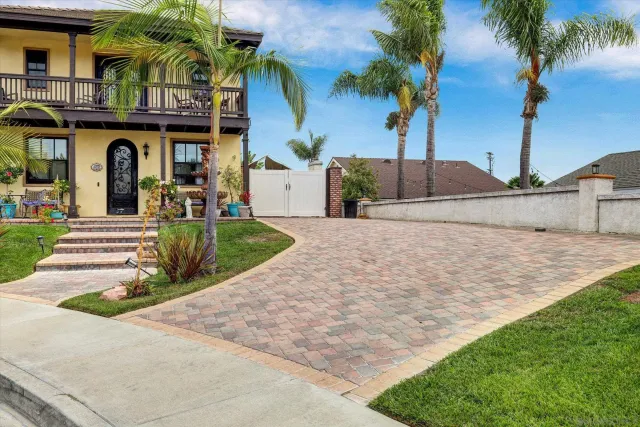 a view of a backyard of the house