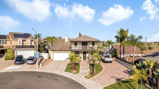 a view of a swimming pool with sitting area