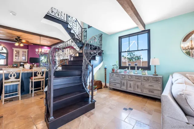 a room with furniture and a wooden floor