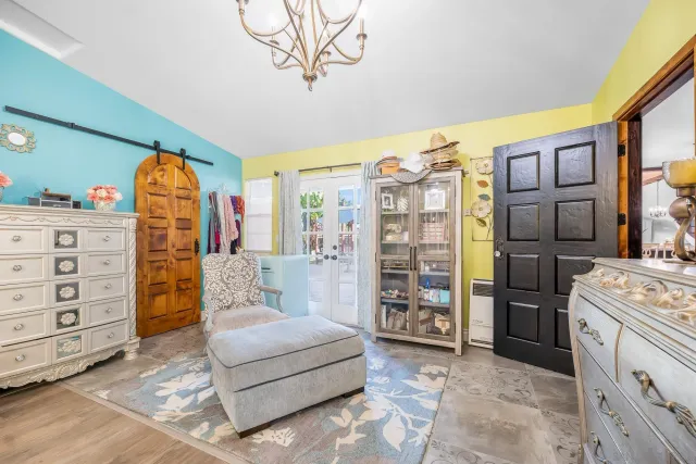 a bedroom with a bed and a walk in closet