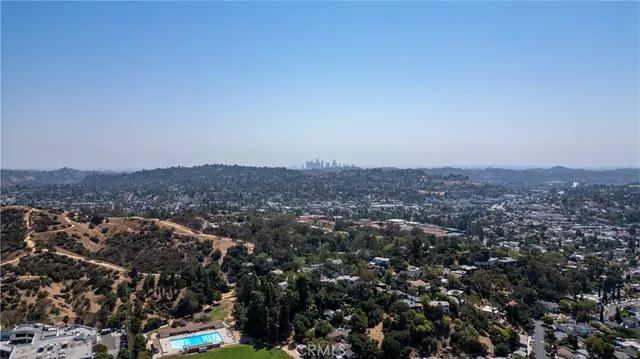 an aerial view of residential house with outdoor space