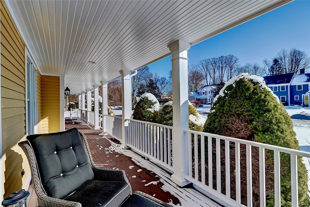 11 Jacobs Point Road Warren, RI 02885 - Photo 4 of 35 Front porch offers multiple spots for relaxing and enjoying the ocean breezes.
