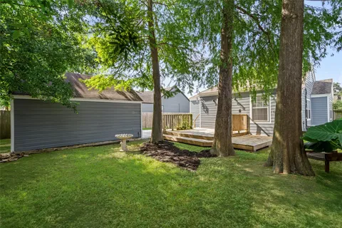 a backyard of a house with seating space