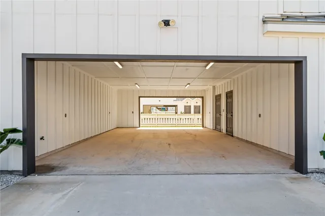 a view of walk in closet with white walls