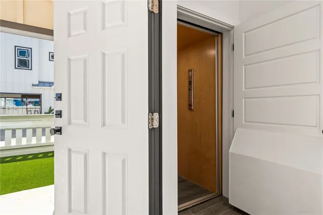 a view of an apartment with a backyard