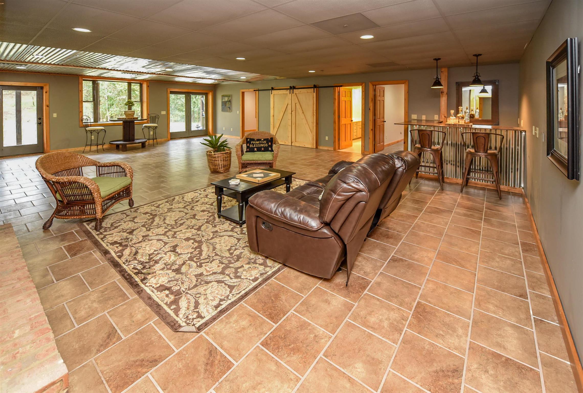 1615 Shell Road Goodlettsville, TN 37072 - Photo 22 of 30 a living room with couches a dining table and kitchen view