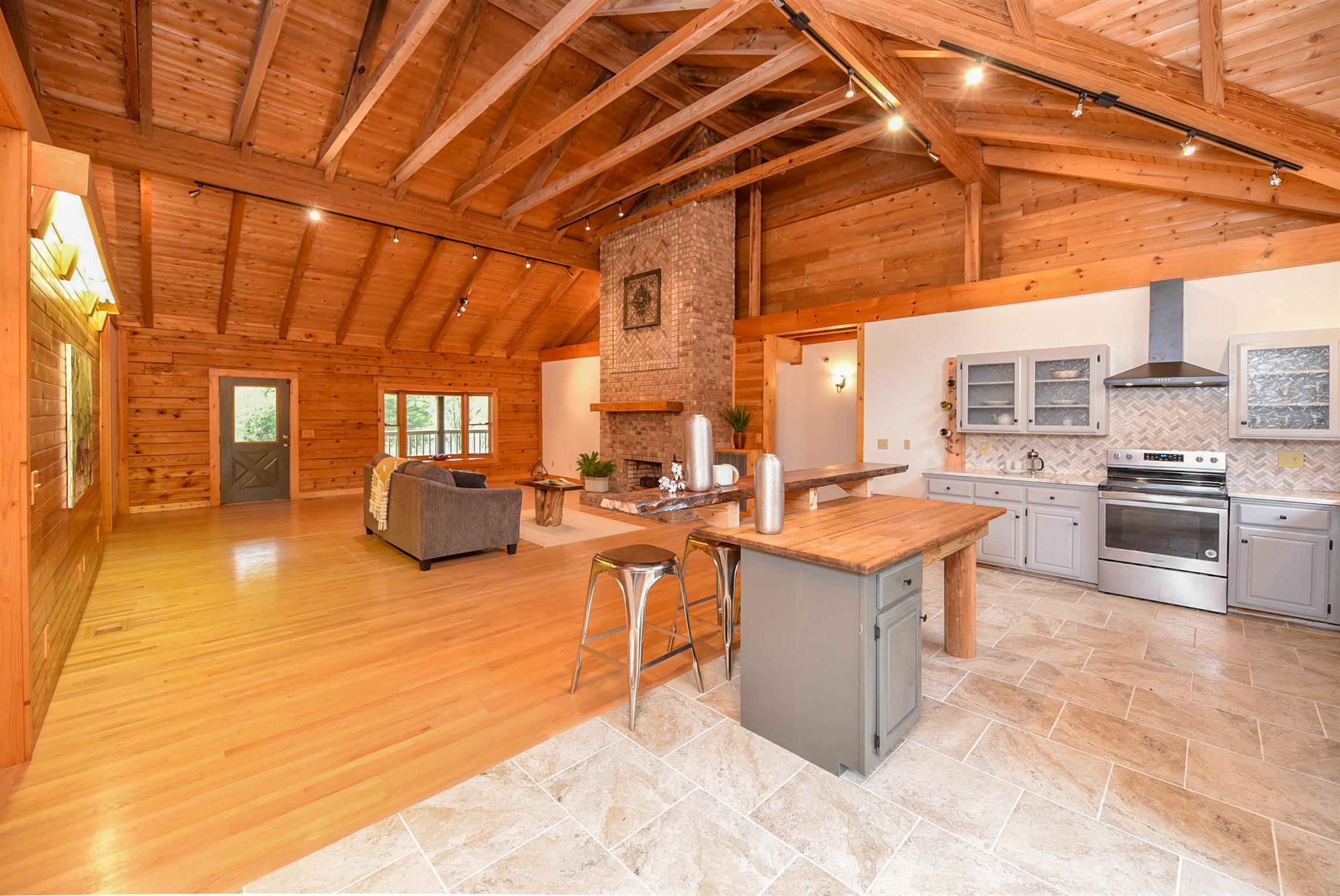 1615 Shell Road Goodlettsville, TN 37072 - Photo 7 of 30 a view of a kitchen with kitchen island wooden cabinets and stainless steel appliances