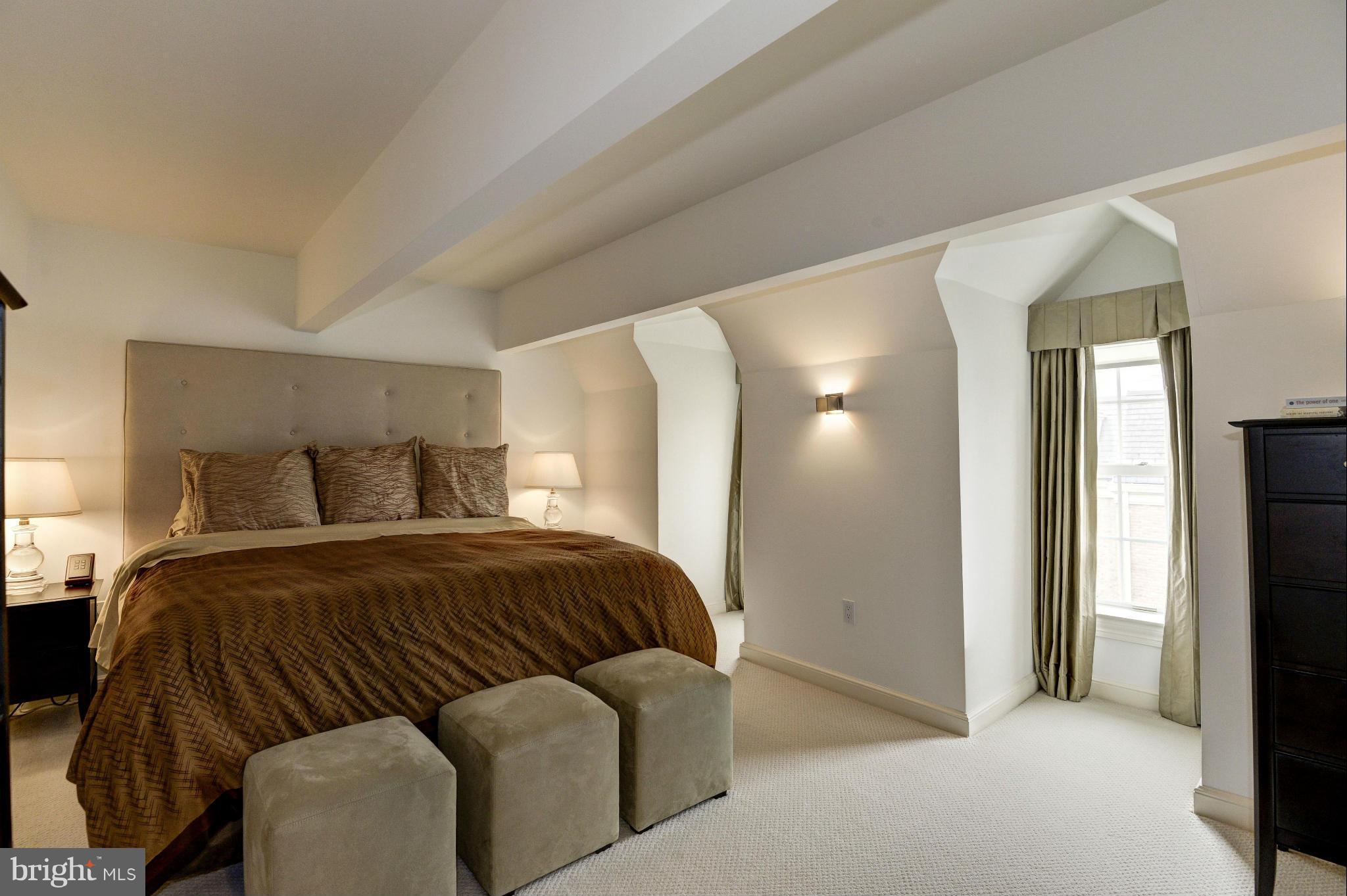 1809 Kalorama Square Washington, DC 20008 - Photo 22 of 27 a bedroom with a bed and a mirror