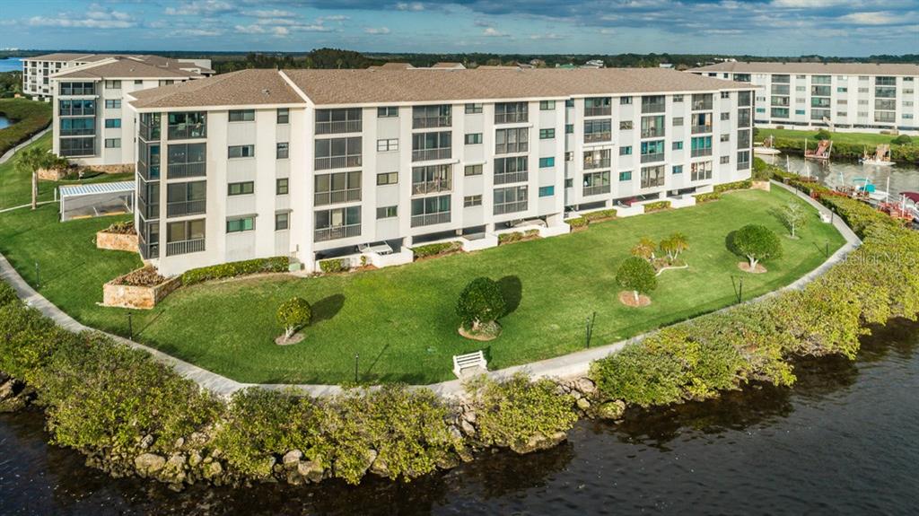 8150 Brent Street, Unit 738 Port Richey, FL 34668 - Photo 1 of 1 End Unit Condo w/ Gulf Views