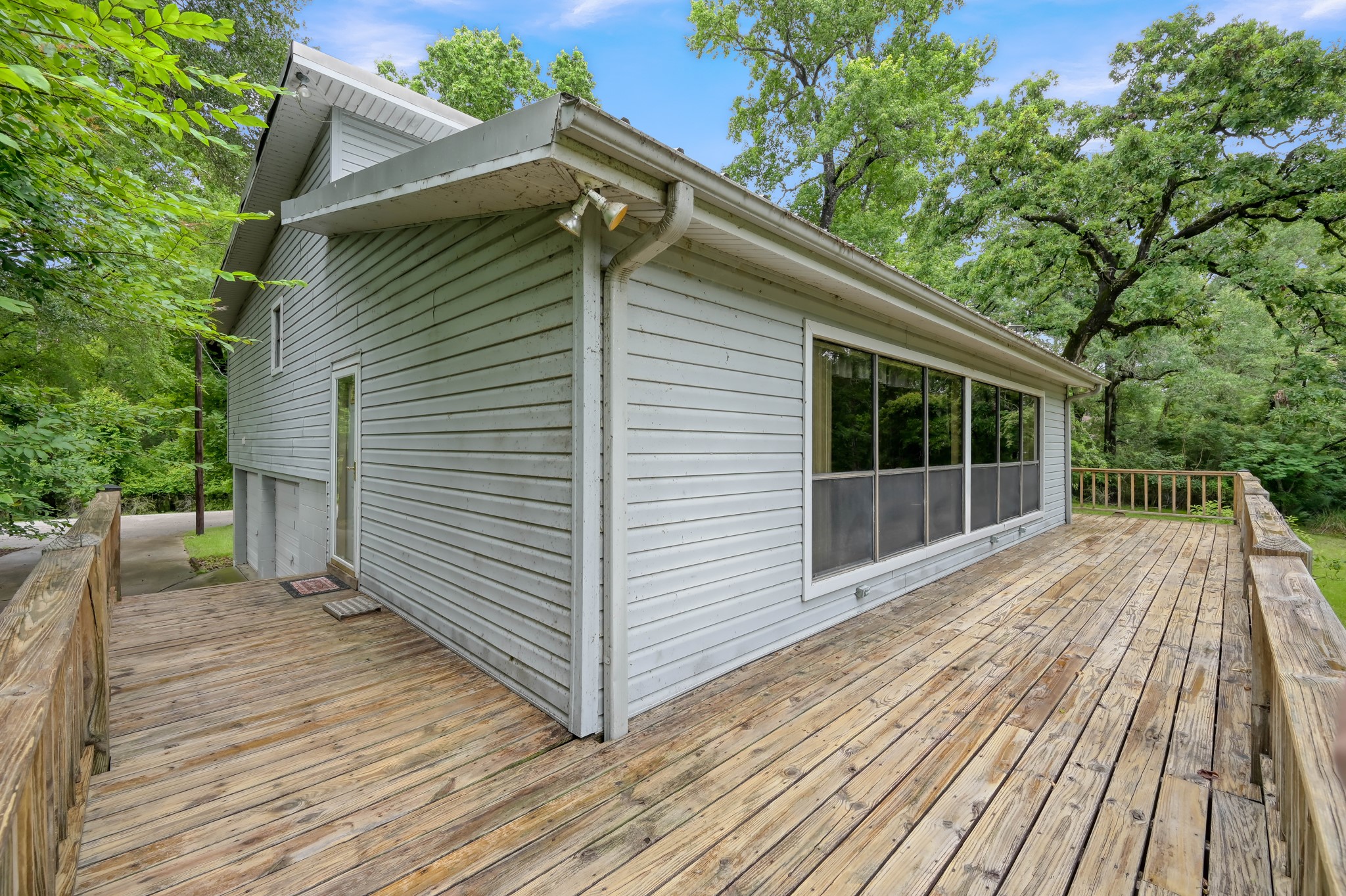 254 Sharp Lane Trinity, TX 75862 - Photo 6 of 36 a view of backyard with a deck and wooden floor