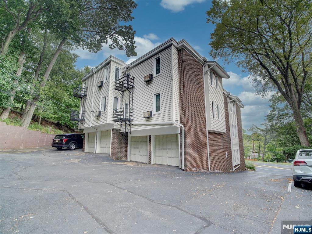 850 Bloomfield Avenue, Unit A3 Montclair, NJ 07042 - Photo 2 of 14 a view of a house with a large space and large trees