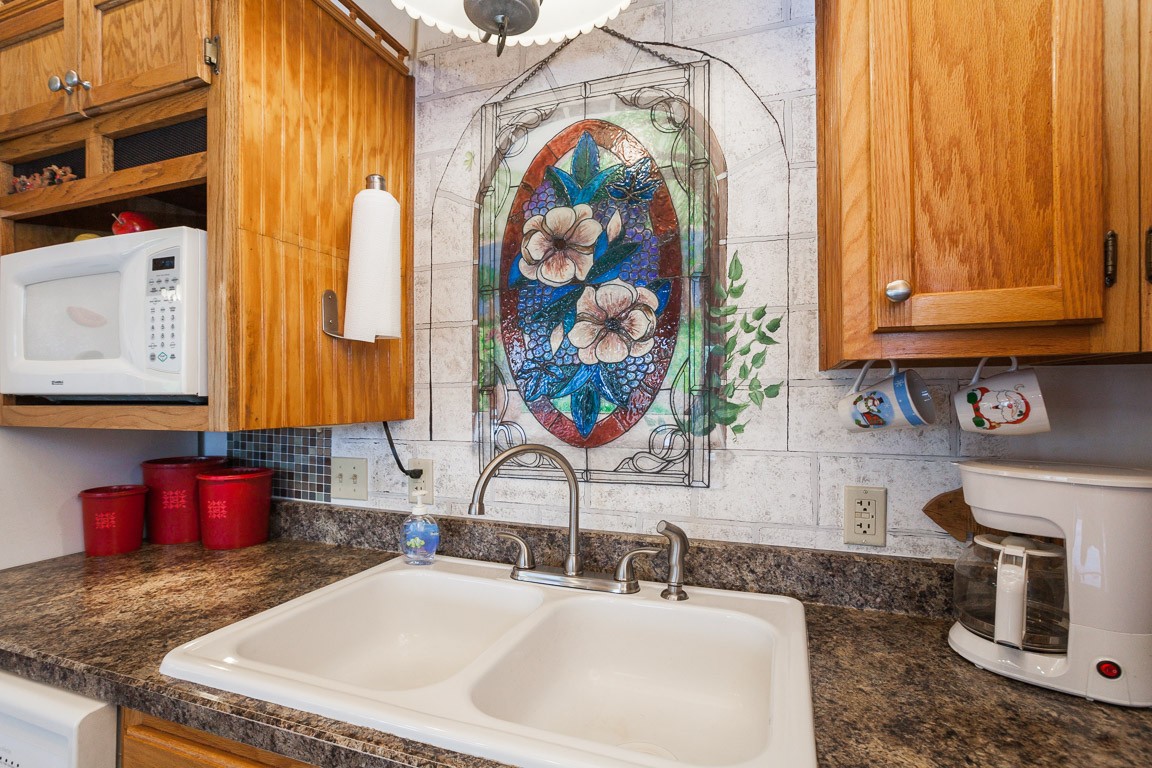 3155 Rocky Point Road Stewart, TN 37175 - Photo 11 of 44 a bathroom with a sink and a mirror