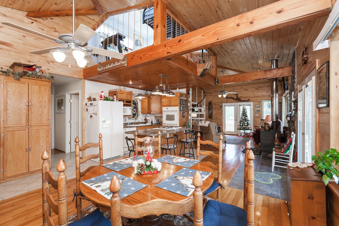 3155 Rocky Point Road Stewart, TN 37175 - Photo 13 of 44 a view of a patio with dining table and chairs