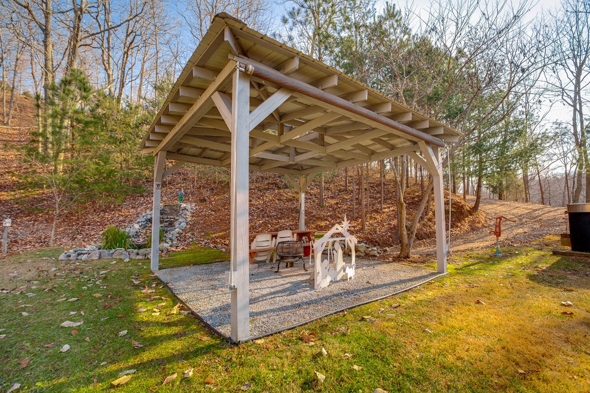 3155 Rocky Point Road Stewart, TN 37175 - Photo 35 of 44 a view of a swimming pool with a patio