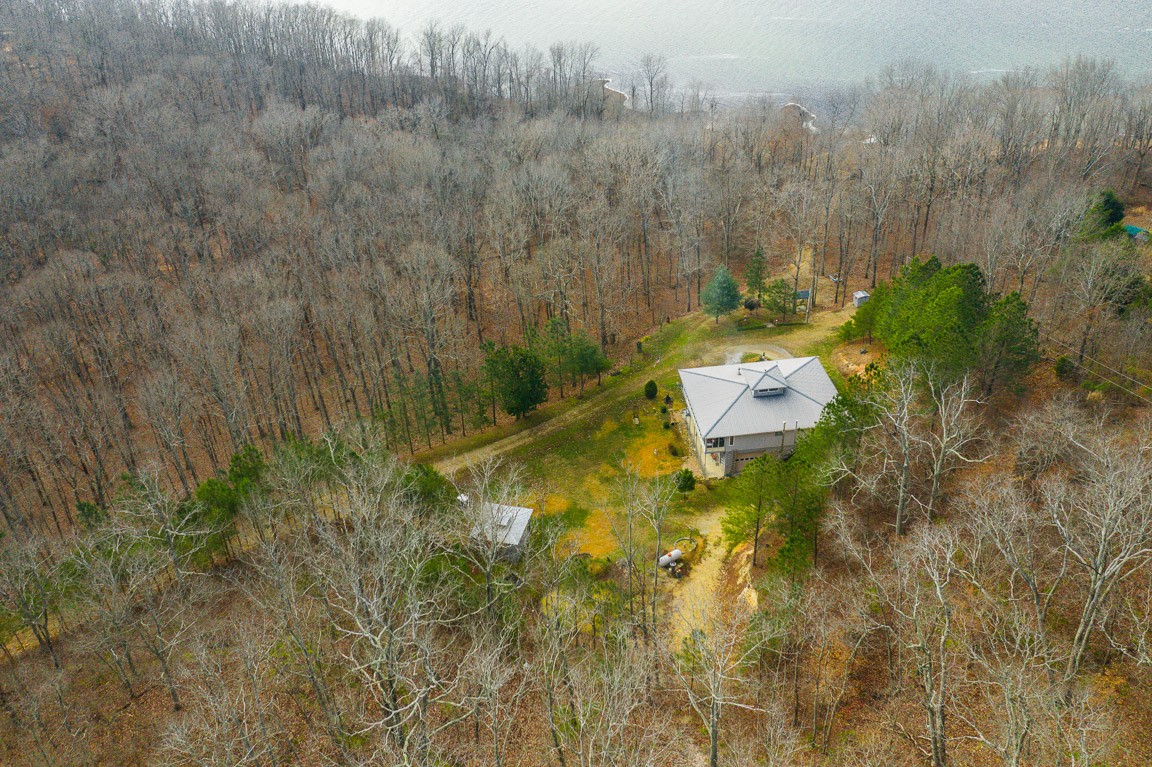 3155 Rocky Point Road Stewart, TN 37175 - Photo 38 of 44 a bathroom with a sink and mirror