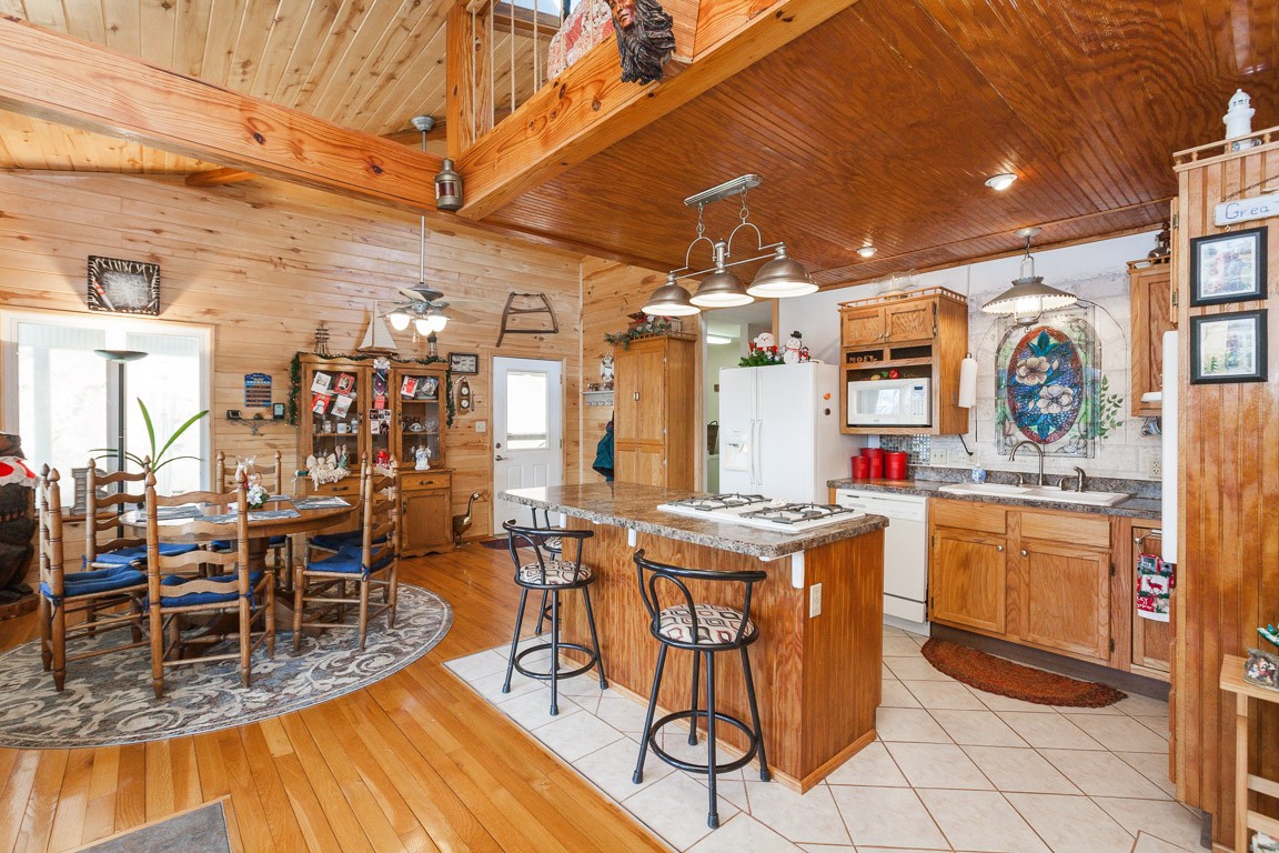 3155 Rocky Point Road Stewart, TN 37175 - Photo 7 of 44 a view of a dining room with furniture